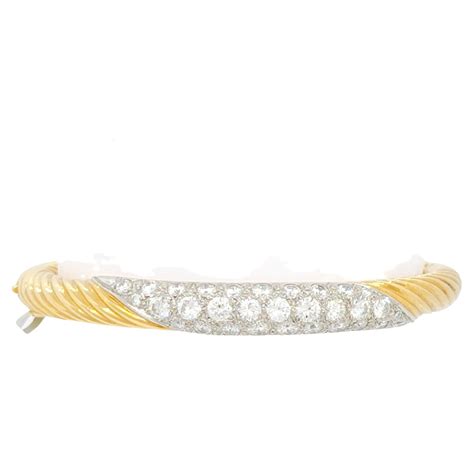 Bracelet Jonc Souple En Or Jaune Et Blanc 18 Carats Avec Grappe De