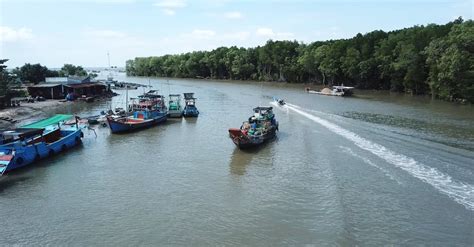 Drone Video of Colorful Fishing Boats on a River Free Stock Video ...