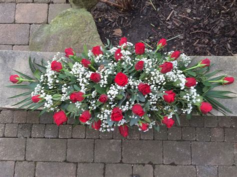 Red Rose And Gyp Spray Funeral Flower Arrangements