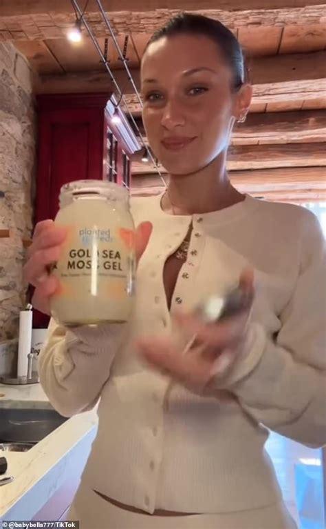 Bella Hadid Shows Off Her Incredible Figure In A Nude Mesh Floral Dress And Caped Cropped Top