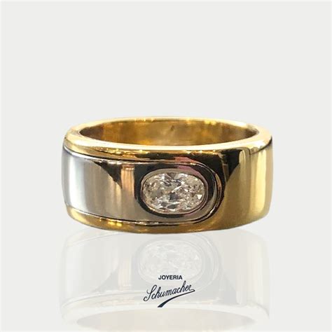 Anillo en oro amarillo y oro blanco con brillante Joyería Schumacher