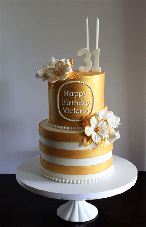 Gold And White Birthday Cake With Stripes The Flowers Are Gilded In Gold For A Nice Finishing