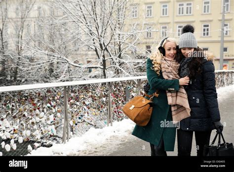 Two Mid Adult Women Wearing Winter Clothes Stock Photo Alamy