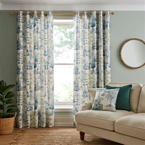 Watercolour Trees Green Eyelet Curtains | Dunelm