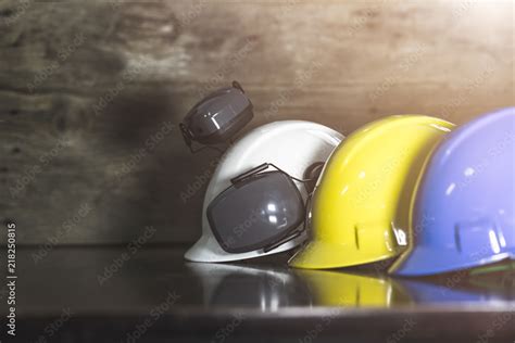 Engineer, electrician and worker 's helmet color as White, Blue and ...