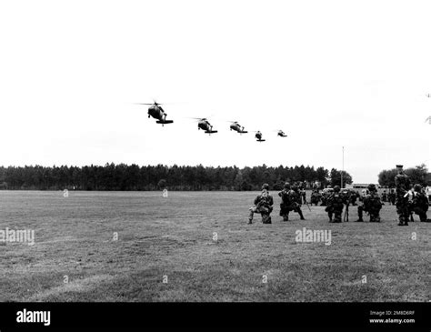 Marines Kneel In Helicopter Teams As They Wait For Five U S Army UH