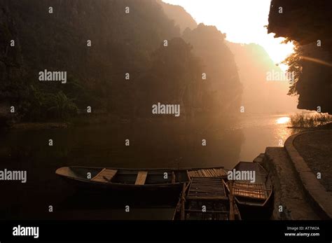 boats sunrise limestone mountain scenery Tam Coc Ninh Binh south of ...