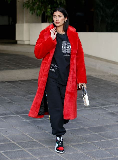 Nicole Williams In An Oversized Phillip Plein Coat With I D Rather Go