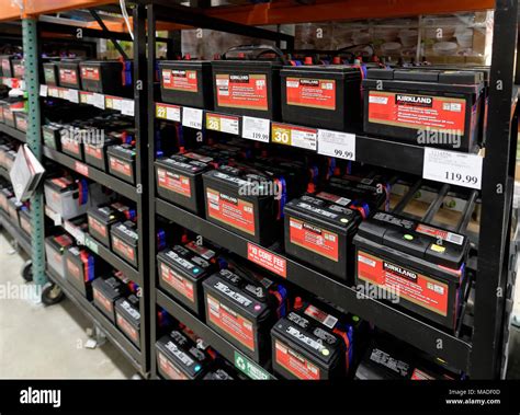 Kirkland brand car batteries on shelves at Costco Wholesale membership ...