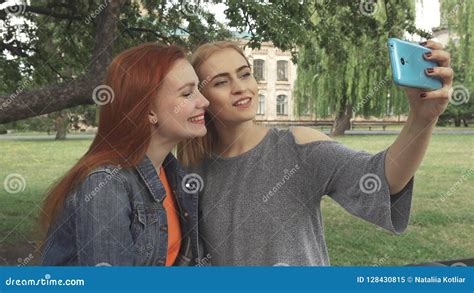 Two Girls Taking A Selfie Outdoors Stock Image Image Of Lips Relax