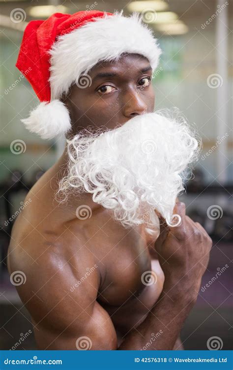 Portrait Of Shirtless Macho Man In Santa Hat Stock Photo Image Of