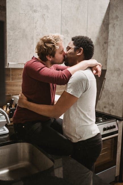 Two Men Kissing Outside · Free Stock Photo