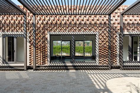 Rlda Designs Brick House In New Delhi With Perforations And Projections