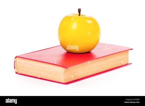 Book with apple Stock Photo - Alamy