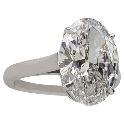 Tiffany and Co. 5 Carat Platinum Oval Cut Diamond Solitaire Engagement Ring. For Sale at 1stDibs