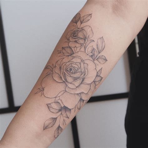 Roses tattoo | Wrist tattoos for women, Delicate tattoos for women