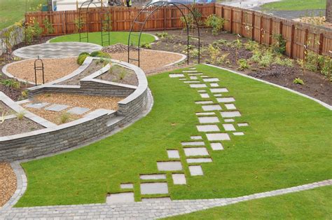 Sandstone Slabs Form Stepping Stone Path Set Into Lawn Stone Garden