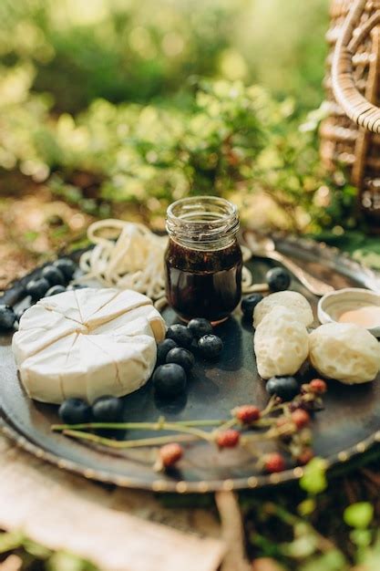 Premium Photo Forest Picnic On The Background Of Moss And Blueberry