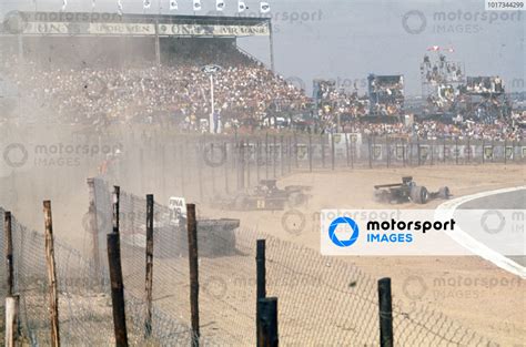 Jochen Mass Surtees Ts Ford In The Catch Fencing While The Two Lotus