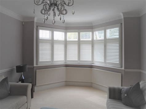 Bay Window Shutters In White Fitted By Droitwich Shutters In Worcester