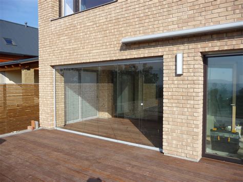 Moderne Terrassenverglasung Mit Windschutz Sunflex SF 20