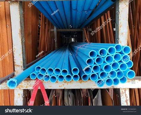 Tubes Pvc Pipes Stacked Warehouse Blue Stock Photo 1727042941