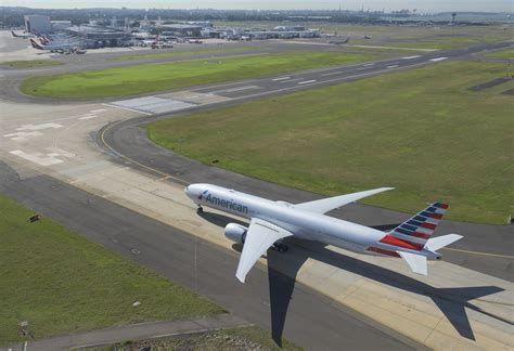 American Airlines 777 300er Flies Over Sydney Harbour Ahead Of Welcome Into Qantas Hangar 96