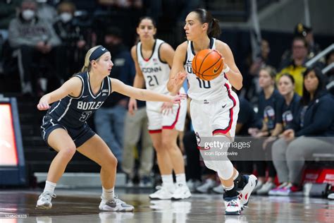 Uconn Huskies Guard Nika Mühl Dribbles On The Perimeter Against News