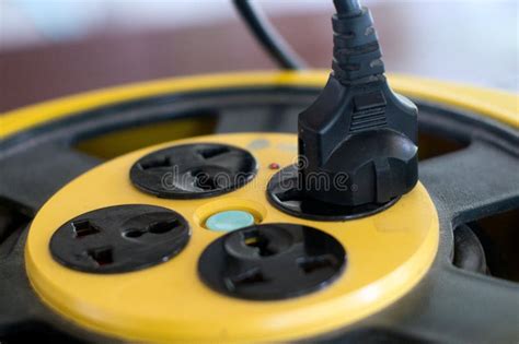 Inserting Power Cord Receptacle In Wall Outlet Stock Photo Image Of