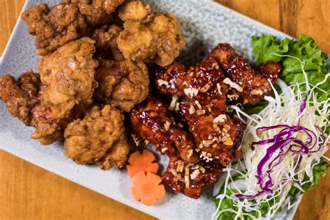 Close-Up Shot of Delicious Korean Food in Ceramic Plate · Free Stock Photo