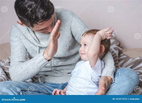 Portrait Of Father And Son`s Baby Fatherhood Love And Protection Of