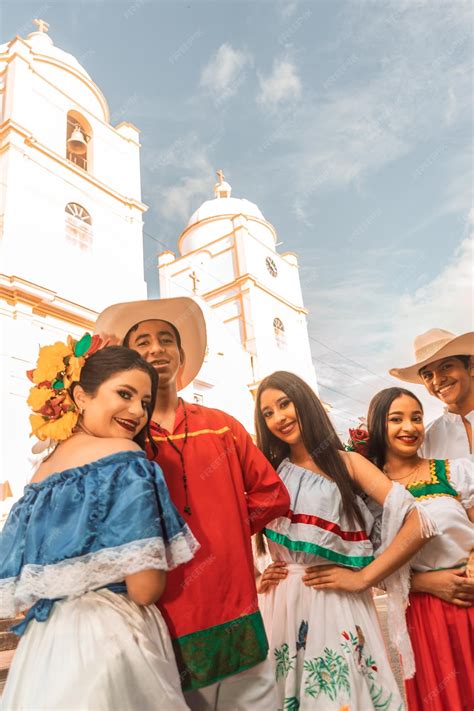 Premium Photo | Teenagers with traditional Latin American clothing with ...