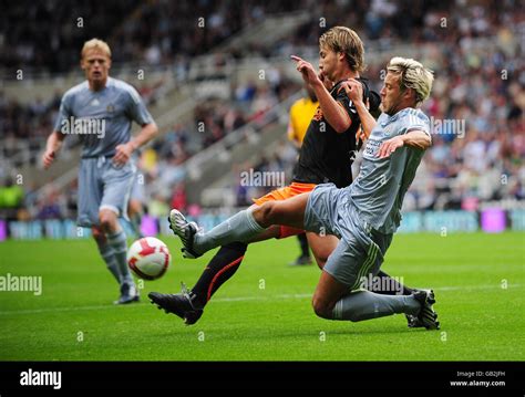 Newcastle United S Alan Smith Tackles Valencia S Alexis Ruano During