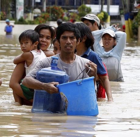 Filipino Villagers Wade Floodwaters Day After Editorial Stock Photo