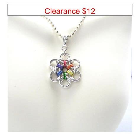 The True Colors Rainbow Pride J Flower Pendant Is Hand Woven In Bright