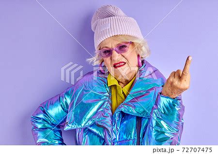 elderly woman shows fuck youの写真素材 72707475 PIXTA
