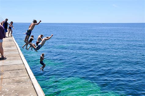 Busselton Jetty Jump Stock Photo Download Image Now Leap Of Faith