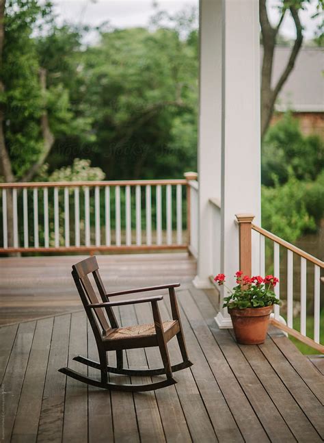 "Rustic Wooden Rocking Chair On Porch" by Stocksy Contributor "Raymond ...