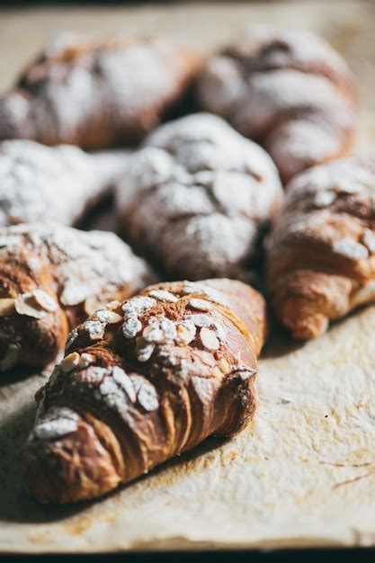 Premium Photo Close Up Of Sweet Croissants On Table