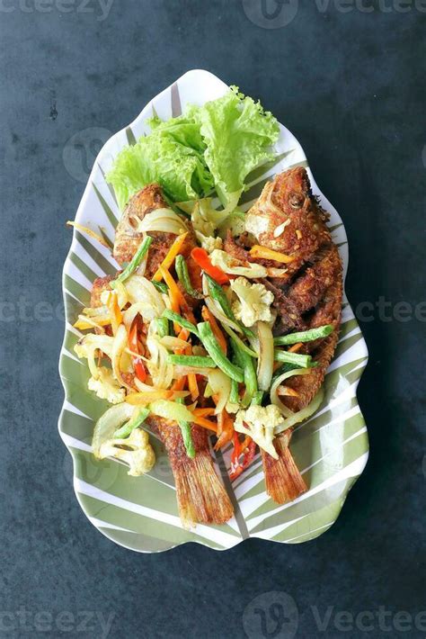 Deep fried tilapia fish 24561299 Stock Photo at Vecteezy