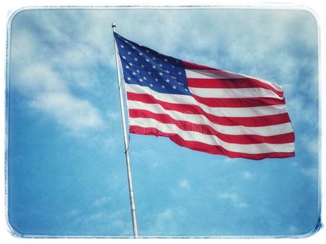 Iconic Uniited States of a America Flag in the Wind Stock Image - Image ...