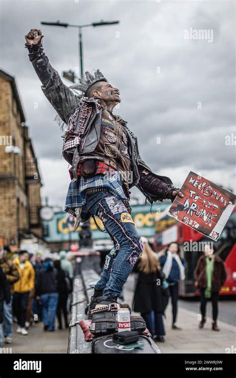 Iconic Pose By The Famous Punk On The Bridge In Londons Camden Stock