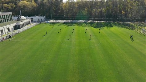 Overhead View of Soccer Practice, Overhead shot capturing soccer players training on the field ...