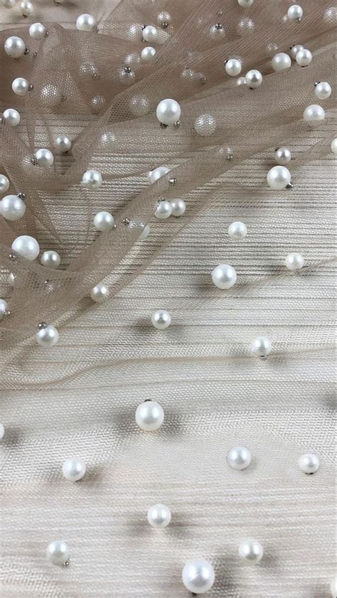 White Pearls And Tulle On Fabric