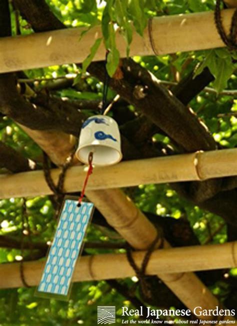 Furin 風鈴 a ceramic wind chime under a wisteria arbor in Tokyo s Kyu