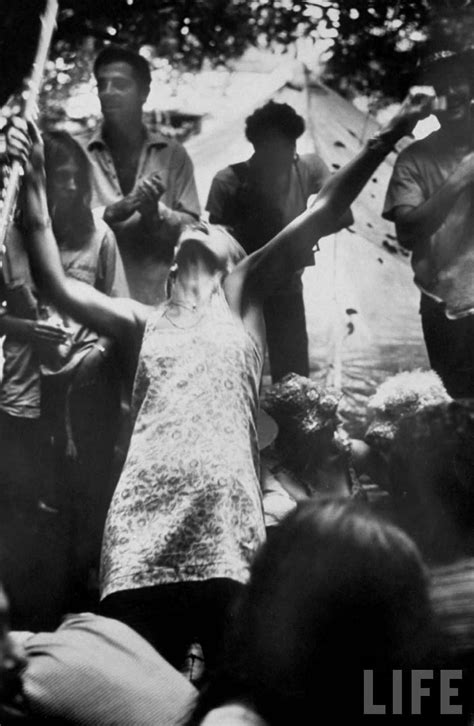 Hippie Girl Enthusiastically Playing Flute And Dancing At Woodstock