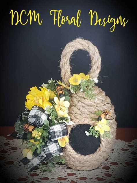 Beehive Floral Arrangement | Bee decor, Spring floral decor, Floral design