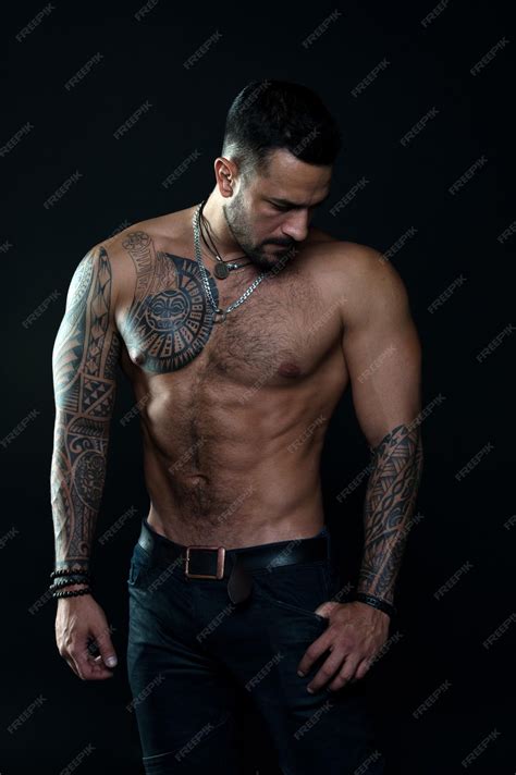 Premium Photo Muscular Torso Jewelry For Real Men Bearded Man With Tattooed Torso Macho Sexy