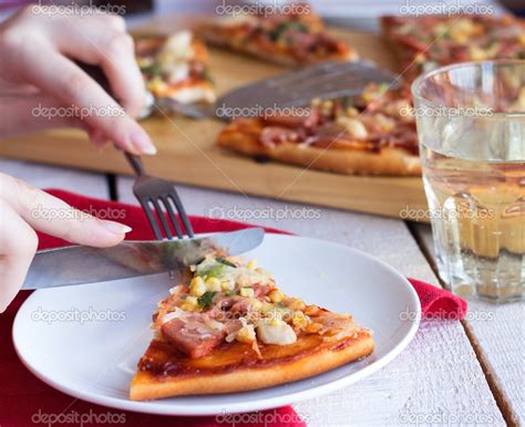 Eat Pizza With A Fork And Knife Stock Photo Haarmony