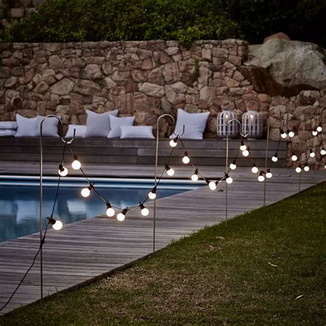 15 Amazing Outdoor Pool With Lighting Ideas | HomeMydesign